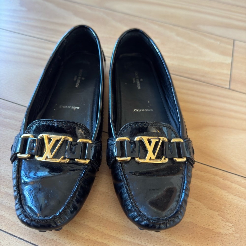 Louis Vuitton Black Loafers with Gold Logo